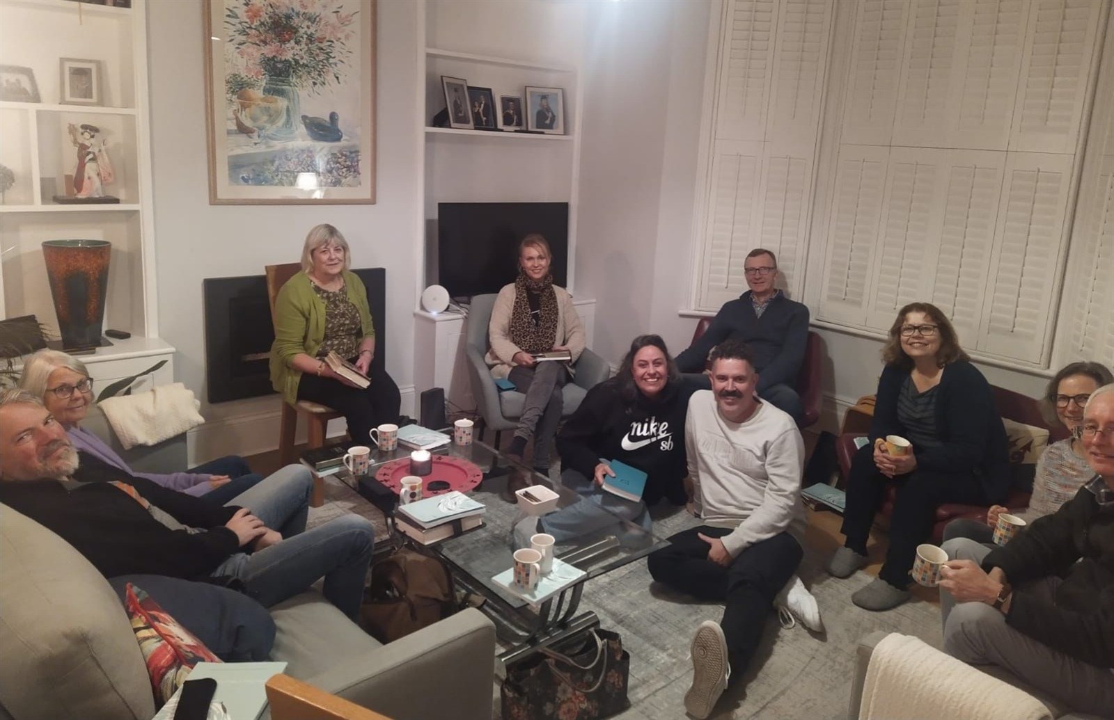 Small group gathered in a living room